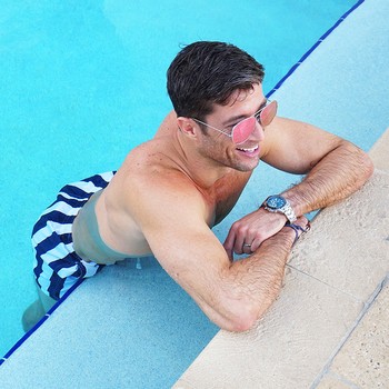 Man lounging at pool